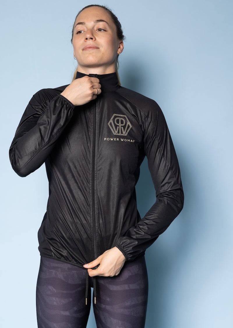 Wind Jacket by Power Woman in the hand-printed Gold Tiger Collection is a light-weight jacket that can easily be folded into your bag or pocket. Snug fit with 4-way stretch material perfect for running, skiing or biking.