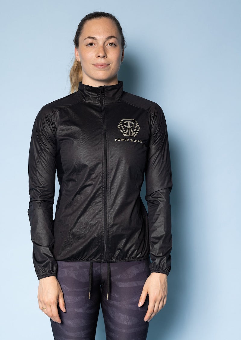 Wind Jacket by Power Woman in the hand-printed Gold Tiger Collection is a light-weight jacket that can easily be folded into your bag or pocket. Snug fit with 4-way stretch material perfect for running, skiing or biking.