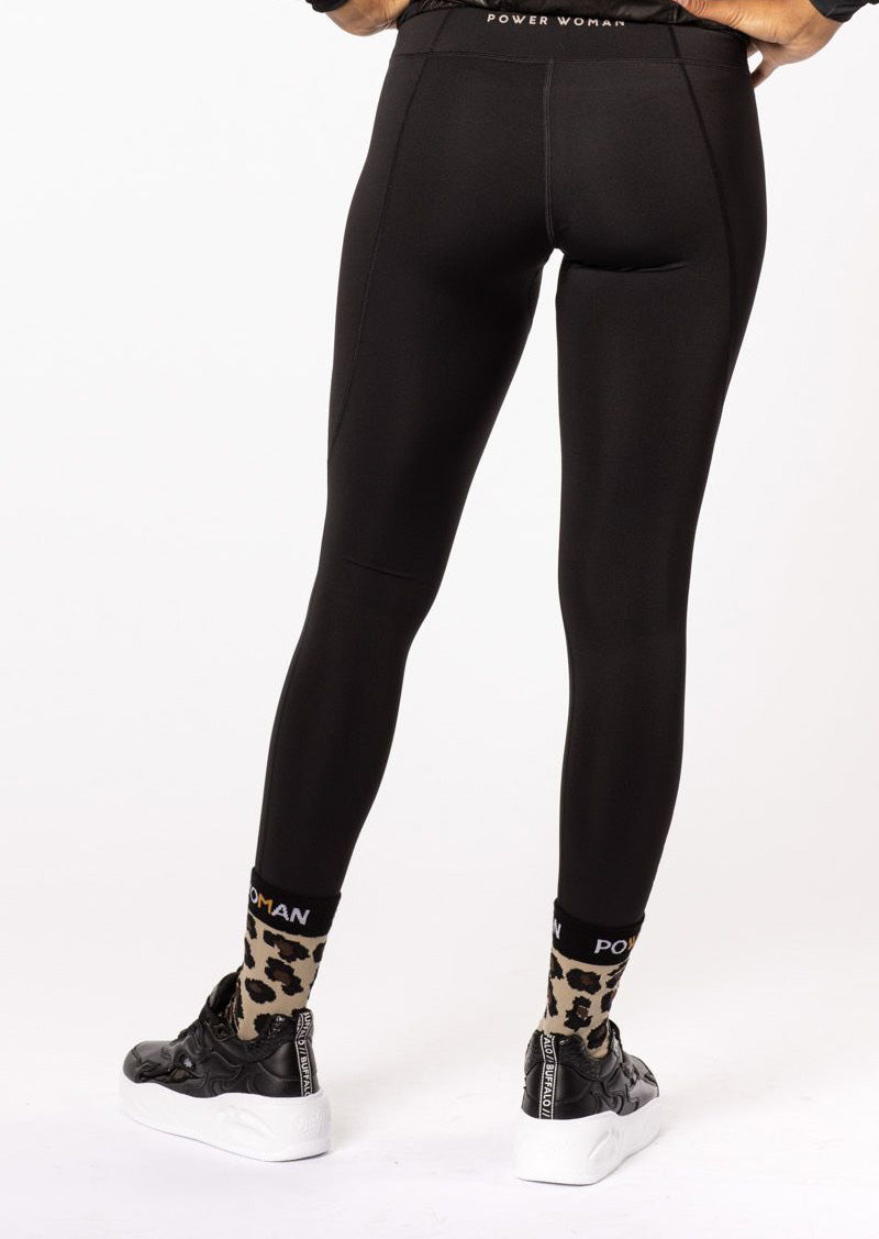 Medium height Bike Sock by Power Woman in Gold Leo Collection. A high quality bike sock with the perfect fit. The sock has the empowering quote "Eat Sleep Cycle Repeat" and is made in the well-known Power Woman Leo pattern. Use during your cycling session or competition for extra comfort. Made in Sweden
