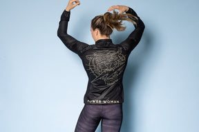 Wind Jacket  by Power Woman in the hand-printed Gold Tiger Collection is a light-weight jacket that can easily be folded into your bag or pocket. Snug fit with 4-way stretch material perfect for running, skiing or biking.