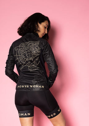 Wind Jacket  by Power Woman in the hand-printed Gold Tiger Collection is a light-weight jacket that can easily be folded into your bag or pocket. Snug fit with 4-way stretch material perfect for running, skiing or biking.