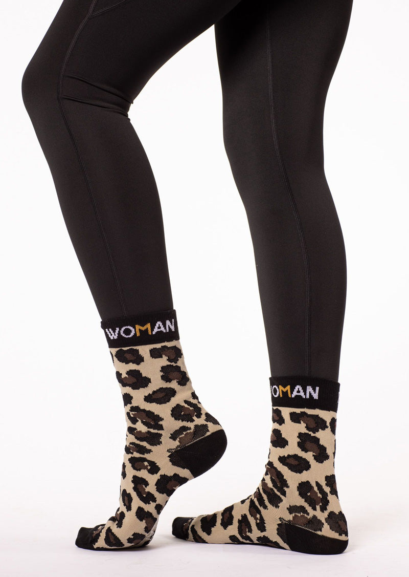 Medium height Bike Sock by Power Woman in Gold Leo Collection. A high quality bike sock with the perfect fit. The sock has the empowering quote "Eat Sleep Cycle Repeat" and is made in the well-known Power Woman Leo pattern. Use during your cycling session or competition for extra comfort. Made in Sweden